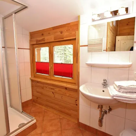 Comfortable Chalet With Whirlpool And Sauna In *
